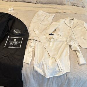 Boys suit set cream color, used once for my sons communion. Good condition.
